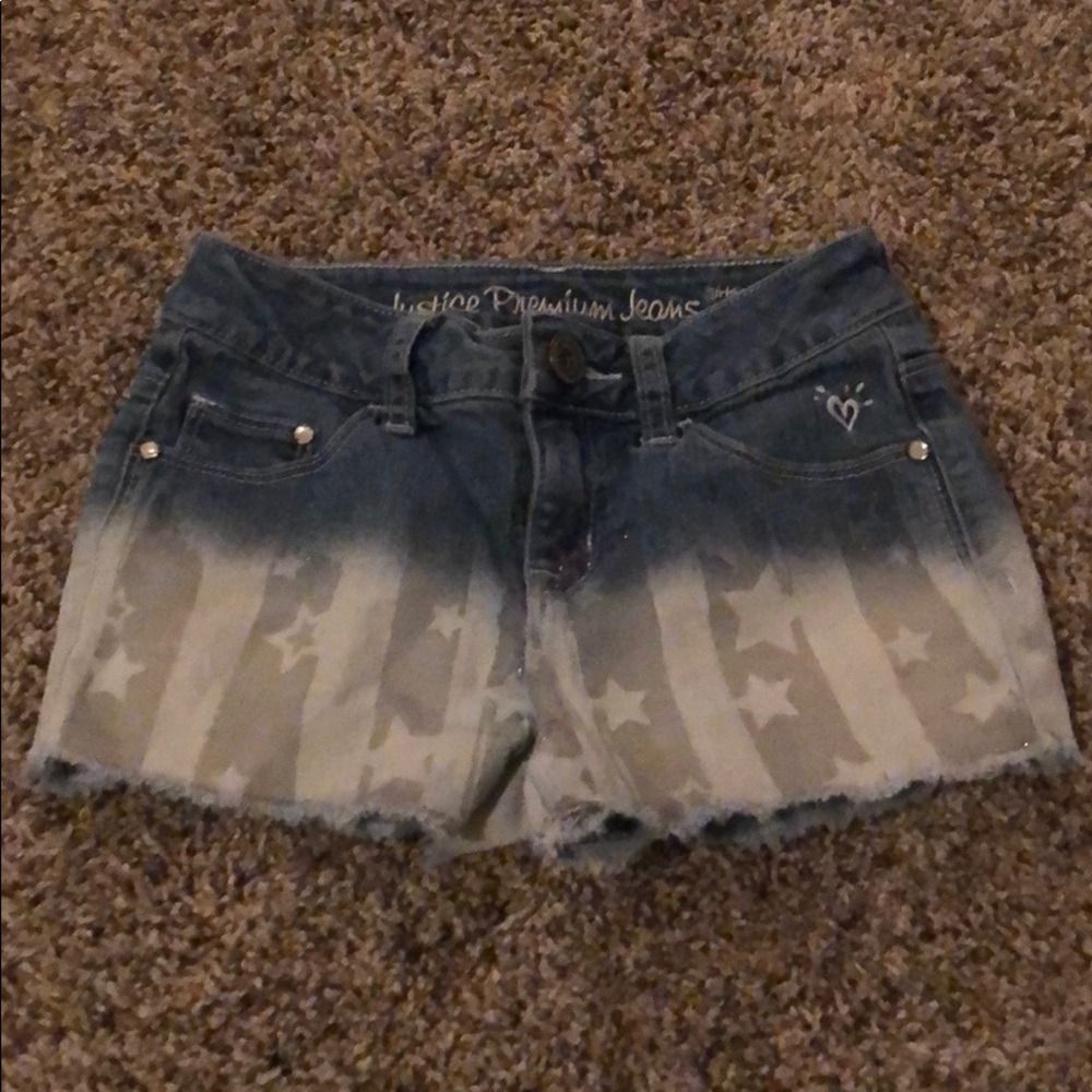 American flag in white and gray shorts